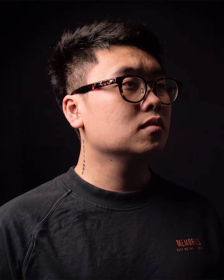 Eddie Nguyen in the studio, lit from the side